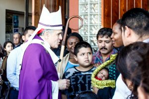 Daniel Cardinal DiNardo greets pilgrims at St. Theresa Sugar Land